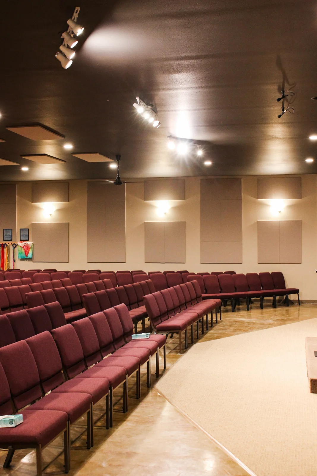 Theater seating under warm LED lighting